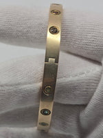 Laden Sie das Bild in den Galerie-Viewer, Scharnier-Armreif in 14k Gelbgold mit Steinbesatz
