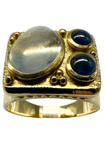 Laden Sie das Bild in den Galerie-Viewer, 18K Gelbgold Ring mit Kristall und Saphir

