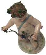 Laden Sie das Bild in den Galerie-Viewer, Meissen Porzellanfigur Putto mit Weinlaub 1. Wahl
