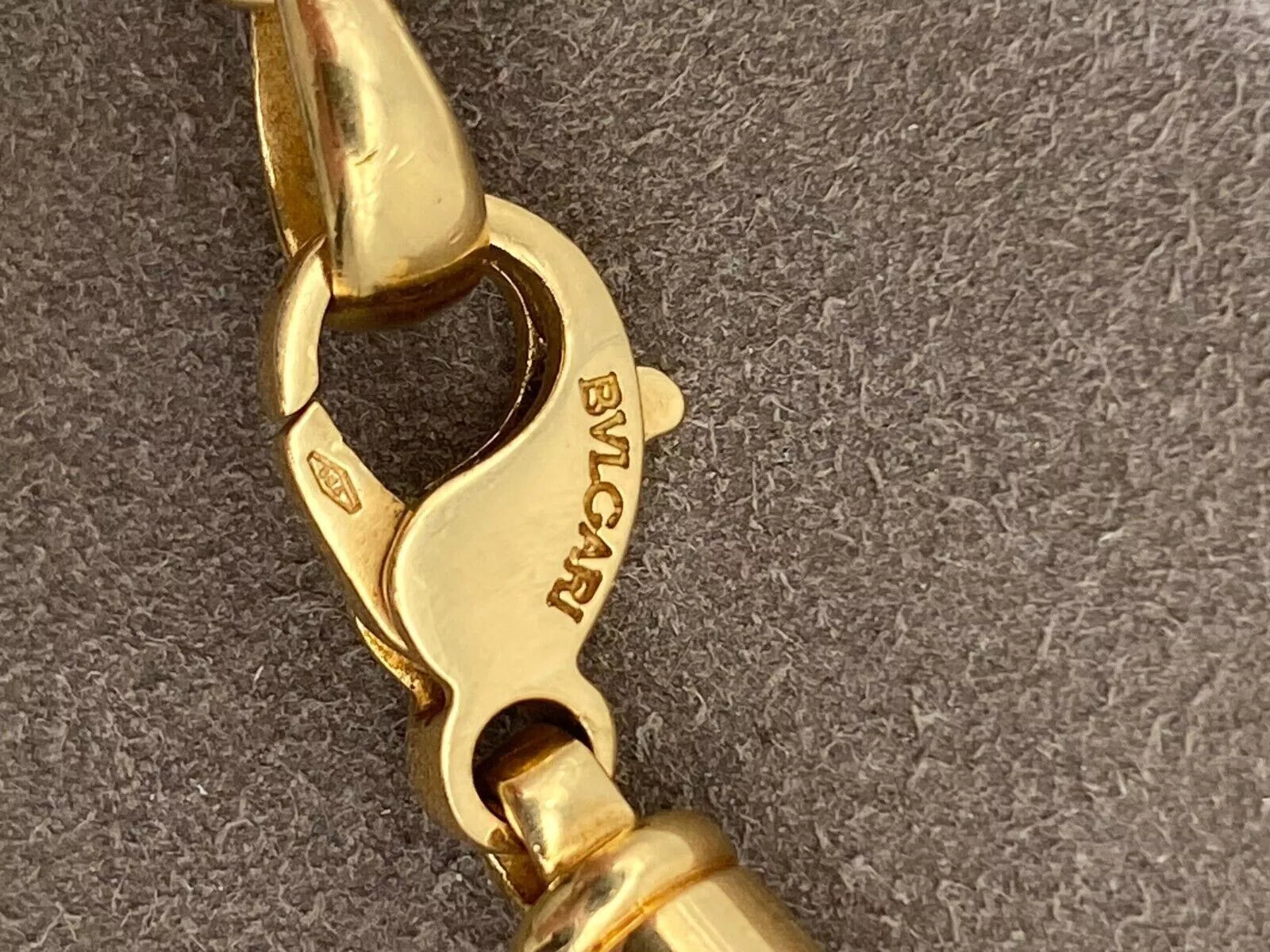 Bulgari mit römischer Münze aus Gold und Leder-Halskette